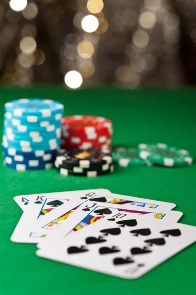 Texas Poker table interface showing community cards and player positions